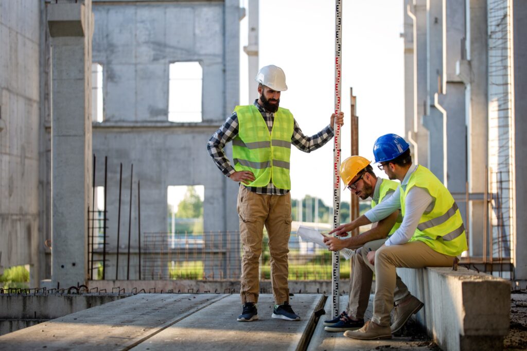 Construction concept of engineer and architect working at construction site